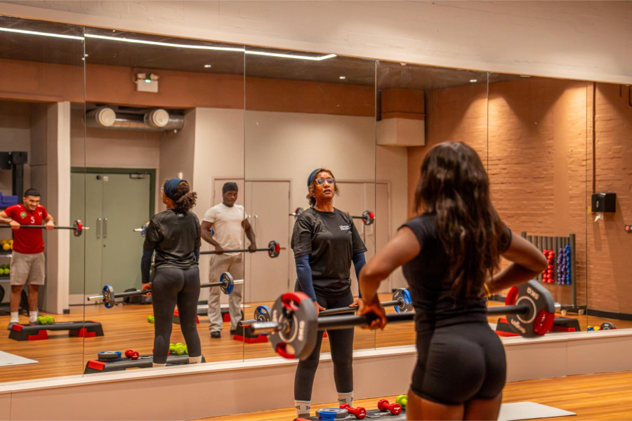 PT running a class