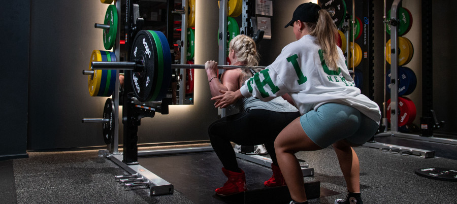 PT shows proper squatting technique